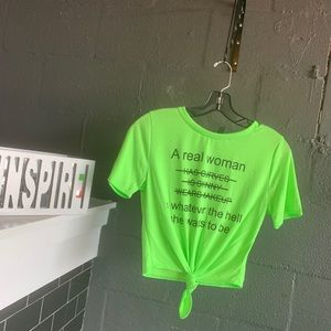 Green “a real women” shirt. Comes in many sizes